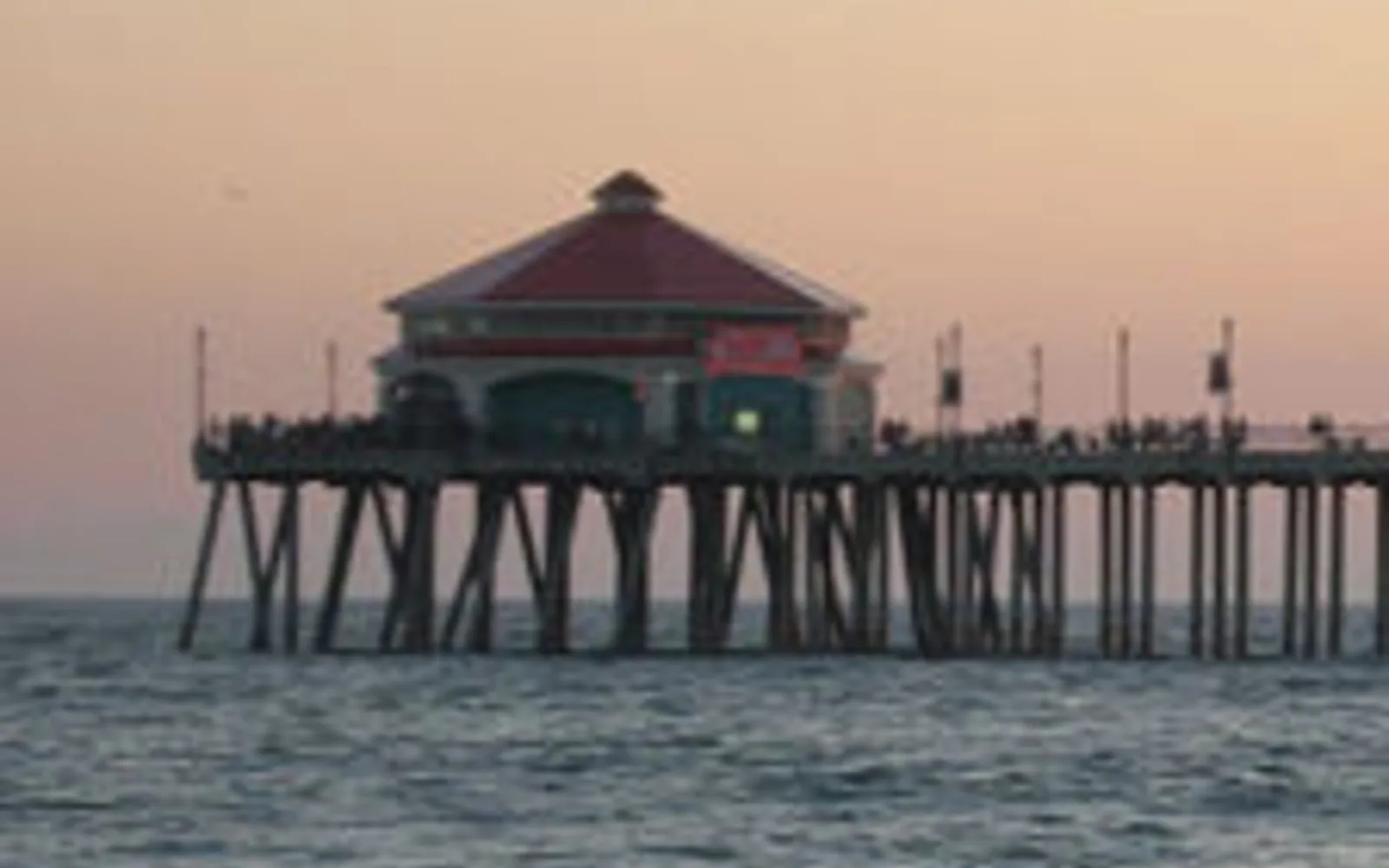 The Huntington Beach Pier extending into the Pacific Ocean